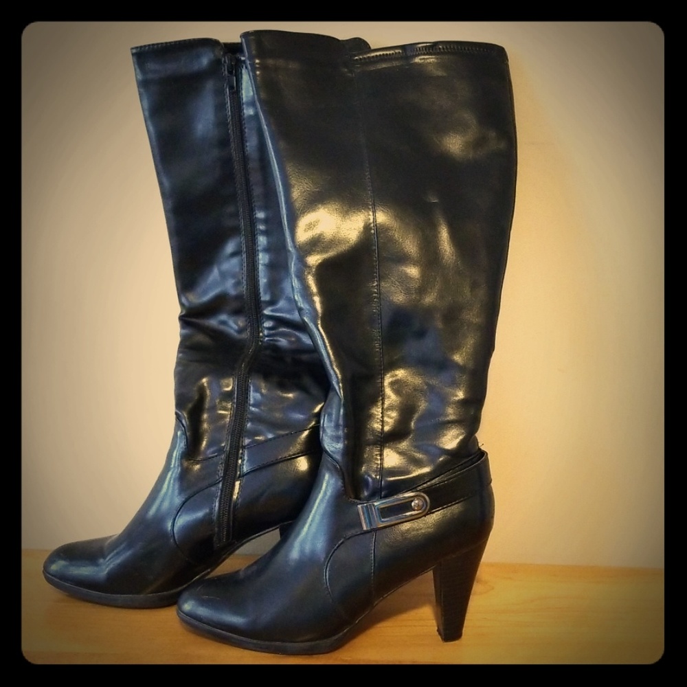 Black knee length boots with silver detail